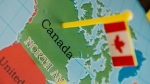 Tiny Canada flag on map