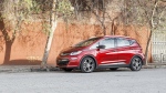 This photo provided by Edmunds shows a 2017 Chevrolet Bolt EV. There are upsides to purchasing a used electric vehicle such as fuel savings and taking advantage of an available federal tax credit of up to $4,000. (Courtesy of Edmunds via AP)