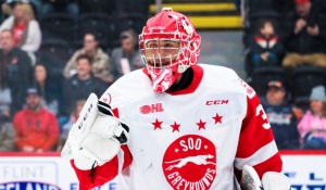 Former Sault Greyhounds goalie Tucker Tynan is suing his former team over the way an injury was handled, and for subjecting him to at least one racial slur, along with other “derogatory” comments.