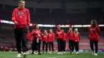 Canada's national women's soccer team captain Christine Sinclair walks off the field to the locker room with her teammates before playing a friendly against Australia in her final international soccer match, in Vancouver, on Tuesday, December 5, 2023. (THE CANADIAN PRESS/Darryl Dyck)