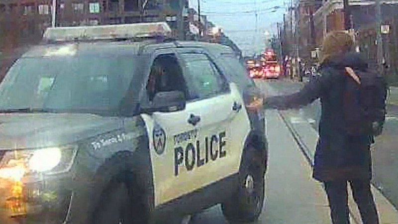Pedestrian, police cruiser