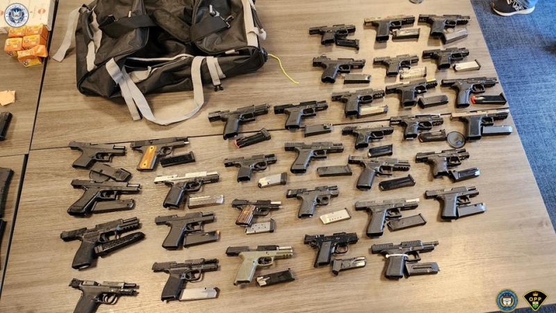 Some of the weapons seized as part of a multi-jurisdictional investigation involving Ontario Provincial Police and U.S. Homeland Security are shown. According to police, 274 illegal firearms were seized as part of the investigation, including 168 in the U.S. and 106 in Ontario. It is believed to be the largest gun seizure in Ontario history. 