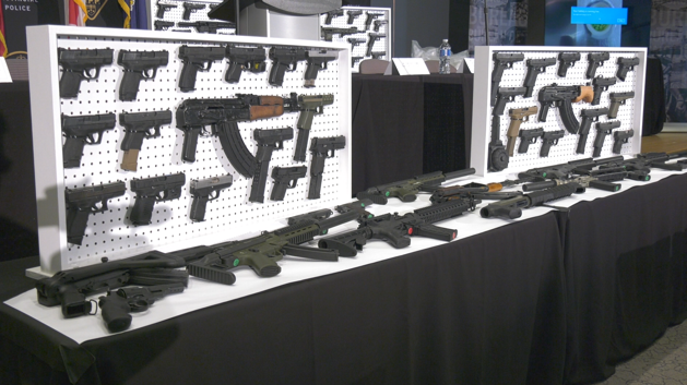 Ontario Provincial Police display weapons seized in Project SAXOM. (CTV News/Christian D'Avino)