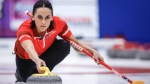 Team Canada alternate Krysten Karwacki delivers a stone as they play Team Newfoundland and Labrador at the Scotties Tournament of Hearts in Calgary, Alta., Thursday, Feb. 22, 2024. THE CANADIAN PRESS/Jeff McIntosh