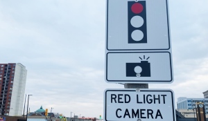 Fraudsters have been trying to take advantage of a new way to scam people out of money: automatic tickets issued when someone runs a red light. (File)