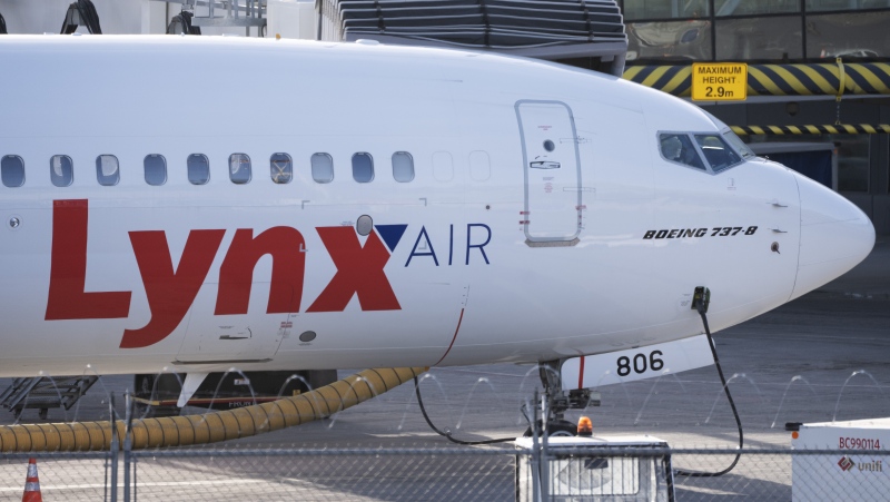 A Lynx Air Boeing 737 jet sits at a gate at the international airport in Calgary on Friday, February 23, 2024. Officials with the Calgary-based company announced Thursday evening that it is ceasing operations, effective at 12:01 a.m. MT on Feb. 26, 2024, after filing for creditor protection. THE CANADIAN PRESS/Todd Korol
