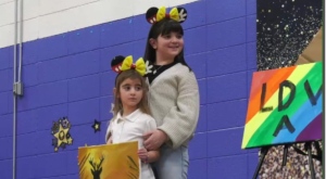 Emma Stivaletta (right) was surprised with a trip to Disney World at her school in Montreal on Feb. 23, 2024. (CTV News) 