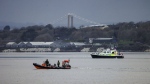 In this photo provided by the U.K. Ministry of Defence (MOD) on Friday, Feb. 23, 2024, the Royal Navy Bomb Disposal Team leave the slip to Torpoint Ferry as they dispose of the WWII bomb discovered in Keyham in Plymouth, England. Britain's Ministry of Defense says a World War II-era bomb whose discovery prompted one of the largest peacetime evacuations in British history has been detonated at sea. The 1,100-pound explosive was discovered Tuesday in the backyard of a home in Plymouth, a port city on the southwestern coast of Britain. (LPhot Barry Swainsbury/Ministry of Defence via AP)