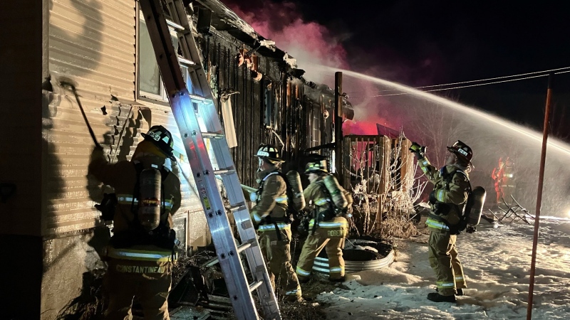 Ottawa firefighters at the scene of a fire on Dunning Road in Ottawa. Feb. 23, 2024. (Ottawa Fire Services)
