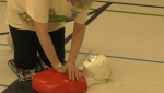 A woman performs CPR at Barrie's Lampman Lane Recreational Centre
