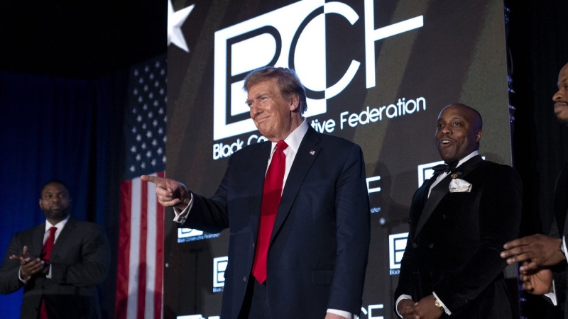 Republican presidential candidate former President Donald Trump arrives at the Black Conservative Federation's Annual BCF Honors Gala at the Columbia Metropolitan Convention Center in Columbia, S.C., Friday, Feb. 23, 2024. (AP Photo/Andrew Harnik)