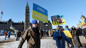 People take part in a demonstration in support of Ukraine on the second anniversary of Russia's invasion, on Parliament Hill in Ottawa on Saturday, Feb. 24, 2024. THE CANADIAN PRESS/Patrick Doyle