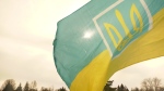 Ukrainian flag waves in Saskatoon (Noah Rishaug / CTV News)
