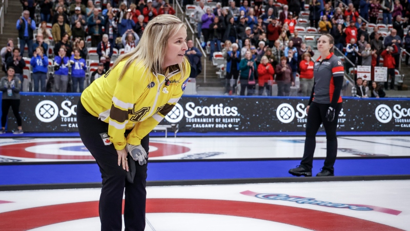 Team Manitoba-Jones skip Jennifer Jones, left, becomes emotional after being defeated by Team Ontario-Homan skip Rachel Homan, right, in the final at the Scotties Tournament of Hearts in Calgary, Sunday, Feb. 25, 2024. THE CANADIAN PRESS/Jeff McIntosh