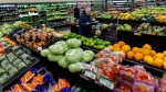 A customer walks through the produce section at a Metro grocery store In Toronto on Friday, Feb. 2, 2024. THE CANADIAN PRESS/Cole Burston