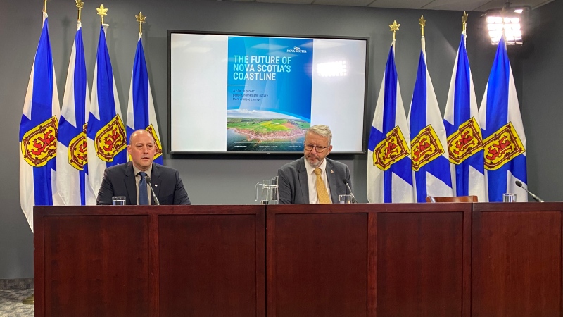 Nova Scotia Environment Minister Tim Halman (left) appears with Municipal Affairs Minister John Lohr at a news conference in Halifax on Monday, Feb. 26, 2024. The ministers announced a plan aimed at protecting homes and communities along the province’s coastline. THE CANADIAN PRESS/Keith Doucette