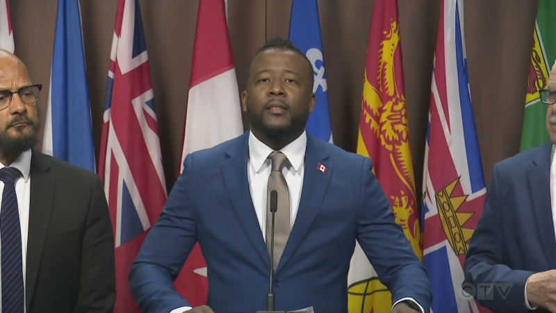 Nicholas Marcus Thompson, executive director of the Black Class Action Secretariat, speaks at a press conference in Ottawa. Feb. 26, 2024. (CTV News)