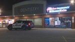 A WRPS police car is seen parked in front of pharmacy in Cambridge after a robbery on February 26, 2024. (Dave Pettitt / CTV Kitchener)