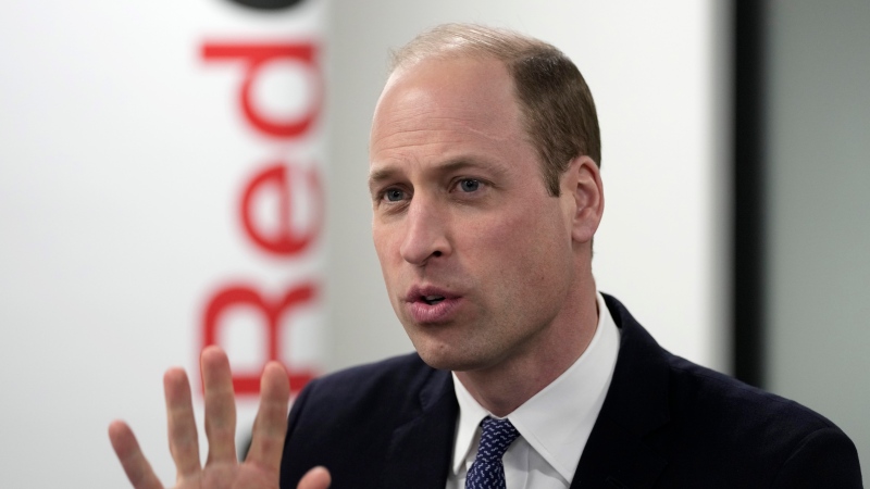Prince William gestures as he visits the British Red Cross at its headquarters in London, Tuesday, Feb. 20, 2024. (AP Photo/Kin Cheung, Pool)