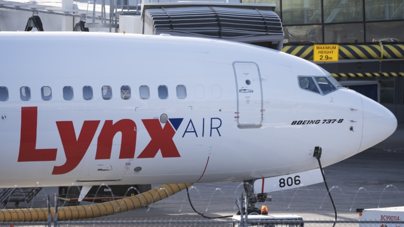 A Lynx Air Boeing 737 jet sits at a gate at the international airport in Calgary on Friday, Feb. 23, 2024. THE CANADIAN PRESS/Todd Korol