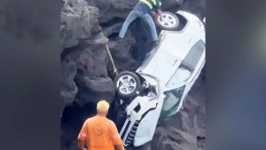 Man rescued after driving rental car off Hawaii