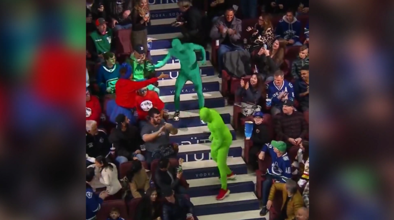 Green Men at the Vancouver Canucks game on Feb. 24, 2024. 