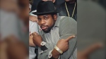 FILE - Run-DMC's Jason Mizell, known as Jam-Master Jay, poses during an anti-drug rally at Madison Square Garden in New York on Oct. 7, 1986. Two suspects have been indicted in the 2002 killing of the hip hop artist, which until now had been one of New York City's most notorious unsolved killings, according to two law enforcement officials, Monday, Aug. 17, 2020. (AP Photo/G. Paul Burnett, File)