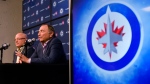 NHL Commissioner Gary Bettman (right) and Deputy Commissioner Bill Daly speak to reporters prior to the Winnipeg Jets and St. Louis Blues NHL game in Winnipeg on Tuesday, February 27, 2024. (Fred Greenslade/The Canadian Press)