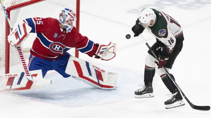 Montreal Canadiens goaltender Sam Montembeault (35) stops a shot by Arizona Coyotes' Jason Zucker (16) during second period NHL hockey action in Montreal on Tuesday, Feb. 27, 2024. THE CANADIAN PRESS/Christinne Muschi