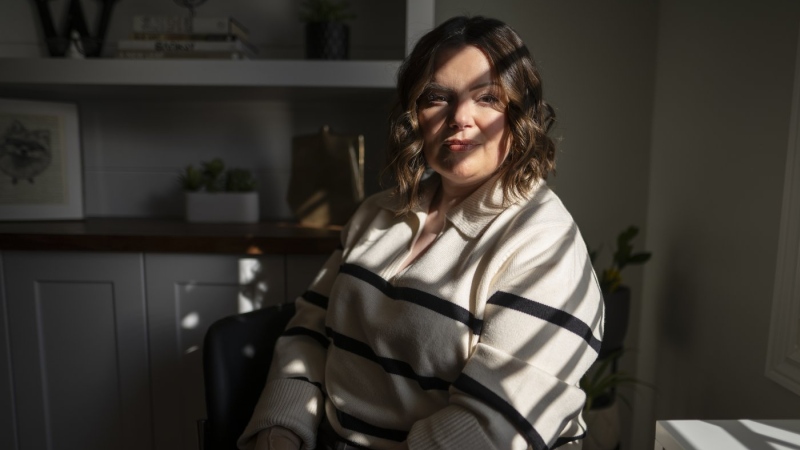Kirsten Watson, at her home in Waterloo, Ont. on Friday, Feb. 23, 2024. She was weeks away last year from losing access to potentially life-saving medication, a situation she found herself in because Ontario does not cover the cost of take-home cancer drugs. THE CANADIAN PRESS/Peter Power
