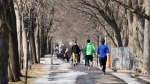 Runners enjoy the mild temperatures in Montreal on Tuesday, Feb. 27, 2024.THE CANADIAN PRESS/Ryan Remiorz