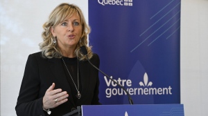 Quebec Municipal Affairs Minister Andrée Laforest announces a environment program for municipalities, Thursday, February 8, 2024 in Scott, Que. (THE CANADIAN PRESS/Jacques Boissinot)