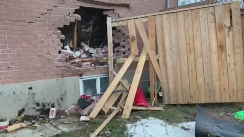 Cleanup is underway after a stolen van crashed into a London home on Feb. 27, 2024. (Bryan Bicknell/CTV News London)