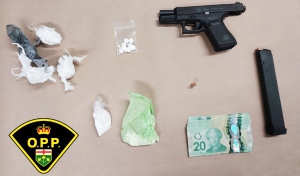 A search of the vehicle uncovered a firearm, high-capacity magazine and suspected cocaine and Fentanyl with an estimated street value of more than $22,000. Feb. 28/24 (OPP photo)