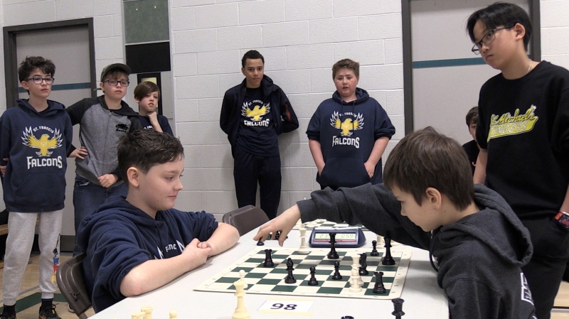 Adrian Skomorowski makes a move during a match with Jonathan Grieve at St. Peter Catholic Elementary School in Guelph on Feb. 28, 2024. (Colton Wiens/CTV Kitchener)