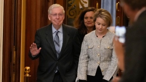 Senate Minority Leader Mitch McConnell of Ky., walks off the Senate floor after speaking, Wednesday, Feb. 28, 2024 at the Capitol in Washington. McConnell says he'll step down as Senate Republican leader in November. The 82-year-old Kentucky lawmaker is the longest-serving Senate leader in history. He's maintained his power in the face of dramatic changes in the Republican Party. (AP Photo/Jacquelyn Martin)