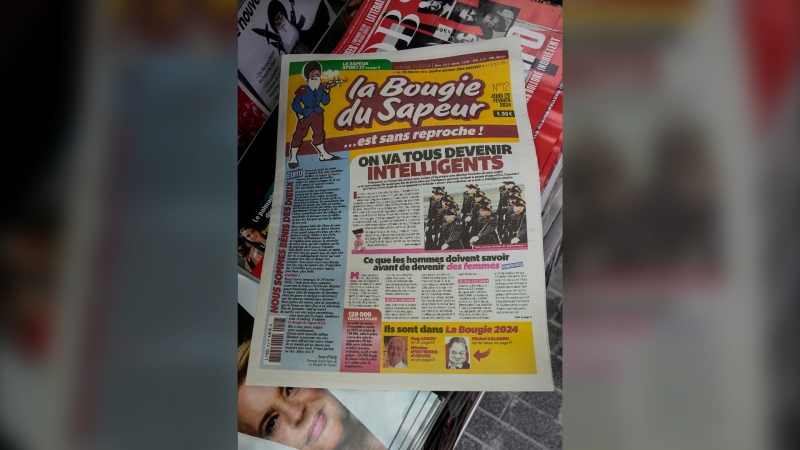 The satirical French newspaper 'La Bougie du Sapeur' is photographed at a newspaper shop in Paris, Thursday, Feb. 29, 2024. (AP Photo/Michel Euler)