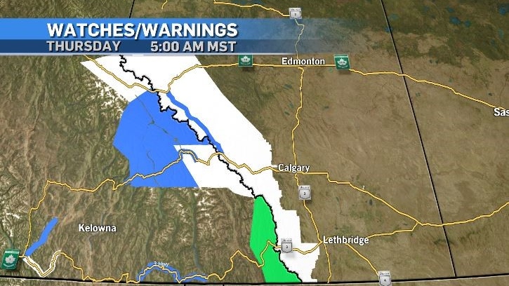Weather warnings issued by Environment and Climate Change Canada for Alberta and B.C. on Feb. 29, 2024, include snowfall warnings (white), rainfall warnings (green) and winter storm warnings (blue).