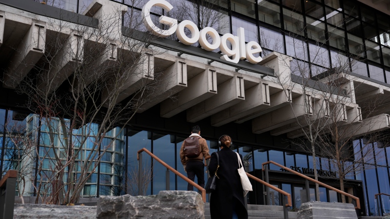People arrive to the recently opened Google building in New York, Monday, Feb. 26, 2024. (AP Photo/Seth Wenig)