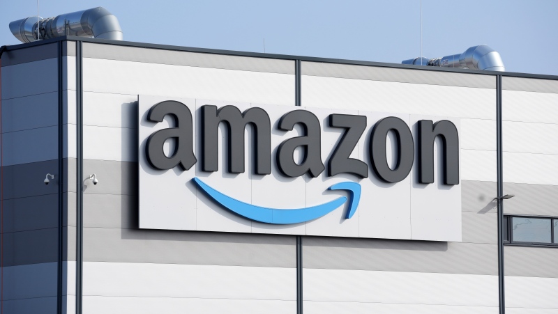An Amazon company logo is seen on the facade of a company's building in Schoenefeld near Berlin, Germany, on March 18, 2022. (AP Photo/Michael Sohn, File)
