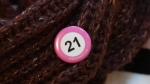 A supporter wears a Bill 21 button at the Quebec Court of Appeal ruling in favour of Bill 21, Quebec's religious symbols law, in Montreal, Thursday, Feb. 29, 2024. THE CANADIAN PRESS/Ryan Remiorz