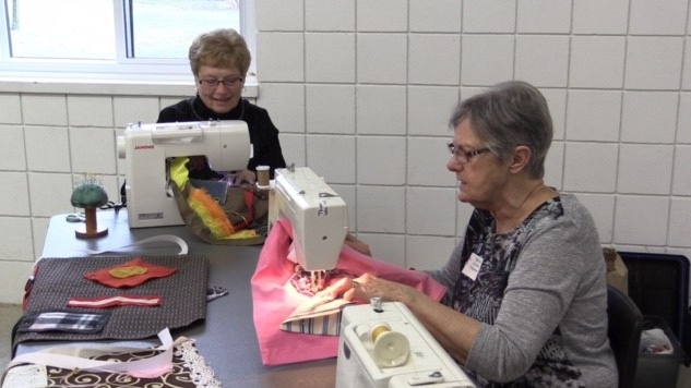Volunteers making “fidget aprons” for dementia and Alzheimer’s patients in Exeter on Feb. 28, 2024. (Scott Miller/CTV News London) 
