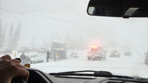A multi-vehicle collision west of Calgary brought traffic to a standstill Thursday around 5 p.m., when heavy snow hit the area. (Photo: Courtesy Jakub Vytrisal)