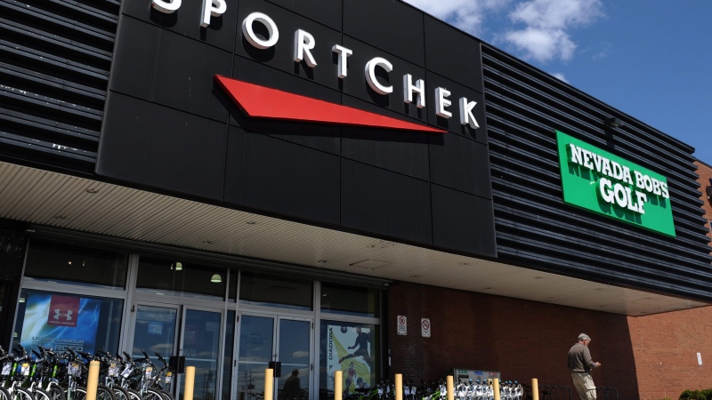 A customer leaves a SportChek and Nevada Bob's Golf store in Ottawa on Monday, May 9, 2011. THE CANADIAN PRESS/Sean Kilpatrick