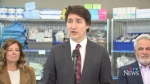 Prime Minister Justin Trudeau(centre) speaks at Health Sciences North hospital in Sudburuy, MP Viviane Lapointe (left) and MP Marc Serre (right) join him. March 2/14 (CTV Northern Ontario)