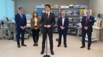 PM Justin Trudeau (centre) speaks at Health Sciences North hospital in Sudbury, MPs Viviane Lapoite (second from left) and Marc Serre (second from right) also made remarks. March 1/24 (Angela Gemmill/CTV Northern Ontario)