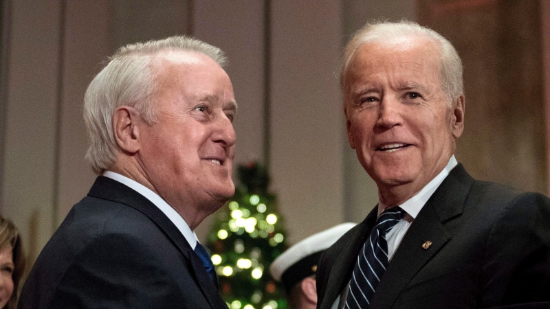 Former prime minister Brian Mulroney (left) greets then-U.S. Vice-President Joe Biden as they arrive at a state dinner on Thursday, Dec. 8, 2016 in Ottawa. (Justin Tang / The Canadian Press)