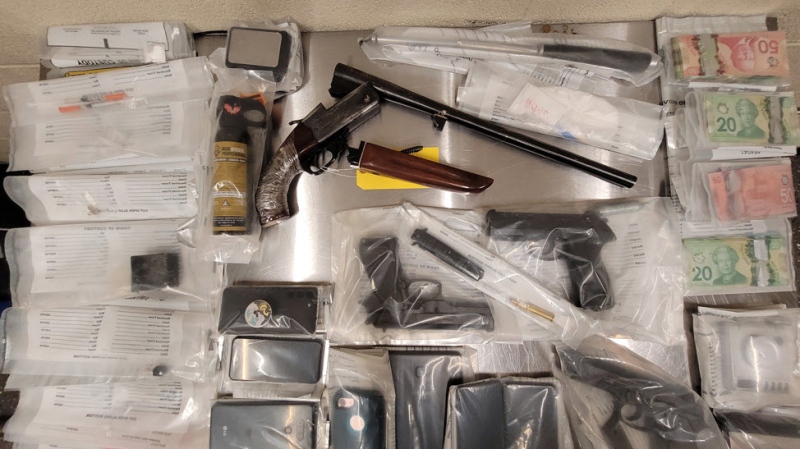 Eight people are facing charges related to stolen weapons and drugs following the execution of a search warrant on Thursday in eastern Ontario. (OPP/ handout)
