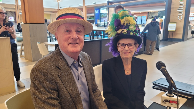 Campaign co-founders Harvey and Elaine Snaden are interviewed during the Hats On For Healthcare Radiothon at the Devonshire Mall food court on March 2, 2024. (Sanjay Maru/CTV News Windsor) 