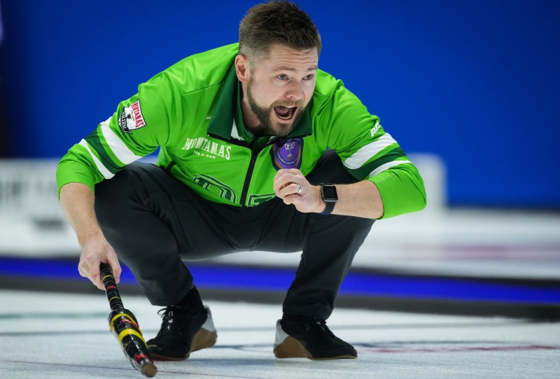 Saskatchewan skip Mike McEwen calls out to the sweepers while playing Team Canada during the Brier, in Regina, on Saturday, March 2, 2024. THE CANADIAN PRESS/Darryl Dyck